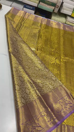 Load and play video in Gallery viewer, Classic Shimmer Gold &amp; Lavender Brocade Tissue Bridal Elegance Kanchipuram Handloom Silk Saree SS27272
