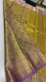 Load and play video in Gallery viewer, Classic Shimmer Gold &amp; Lavender Brocade Tissue Bridal Elegance Kanchipuram Handloom Silk Saree SS27276
