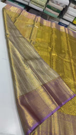 Load and play video in Gallery viewer, Classic Shimmer Gold &amp; Lavender Brocade Tissue Bridal Elegance Kanchipuram Handloom Silk Saree SS27285
