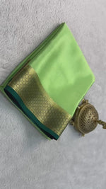 Load and play video in Gallery viewer, Classic Pastel Green Elegance Mysore Silk Saree SS24641
