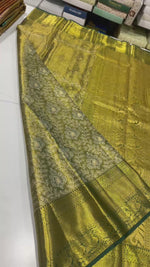 Load and play video in Gallery viewer, Classic Shimmer Gold &amp; Deep Green Brocade Tissue Bridal Elegance Kanchipuram Handloom Silk Saree SS27274
